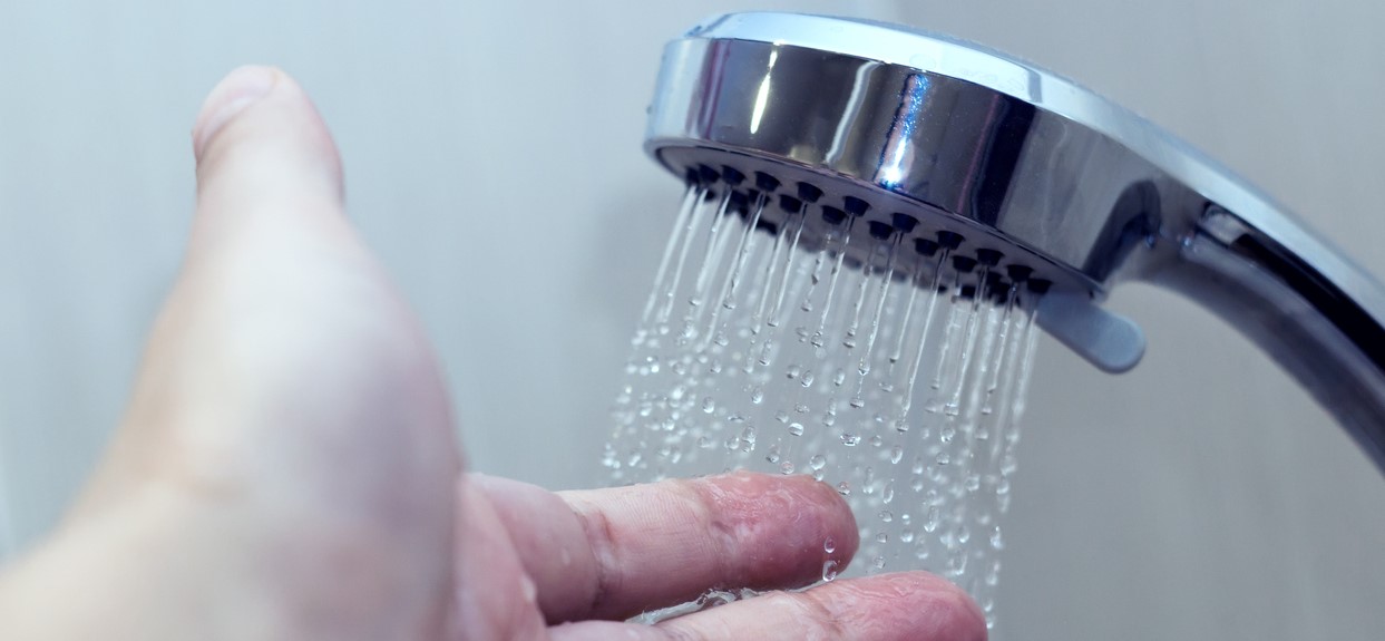 hand in the shower test water temperature